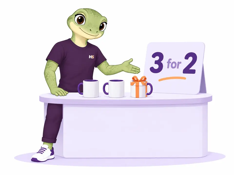 Il geco presenta tre tazze, con un nastro regalo intorno alla terza.